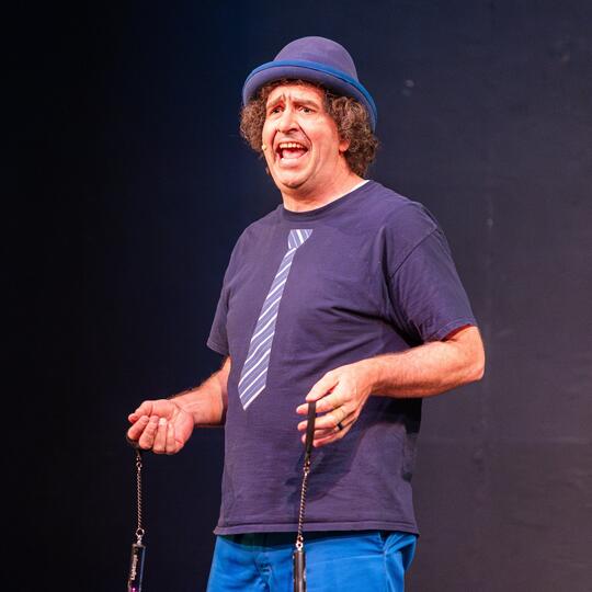 Marcus Wilson brings laughter with a hilarious stage act at Royal Kids event